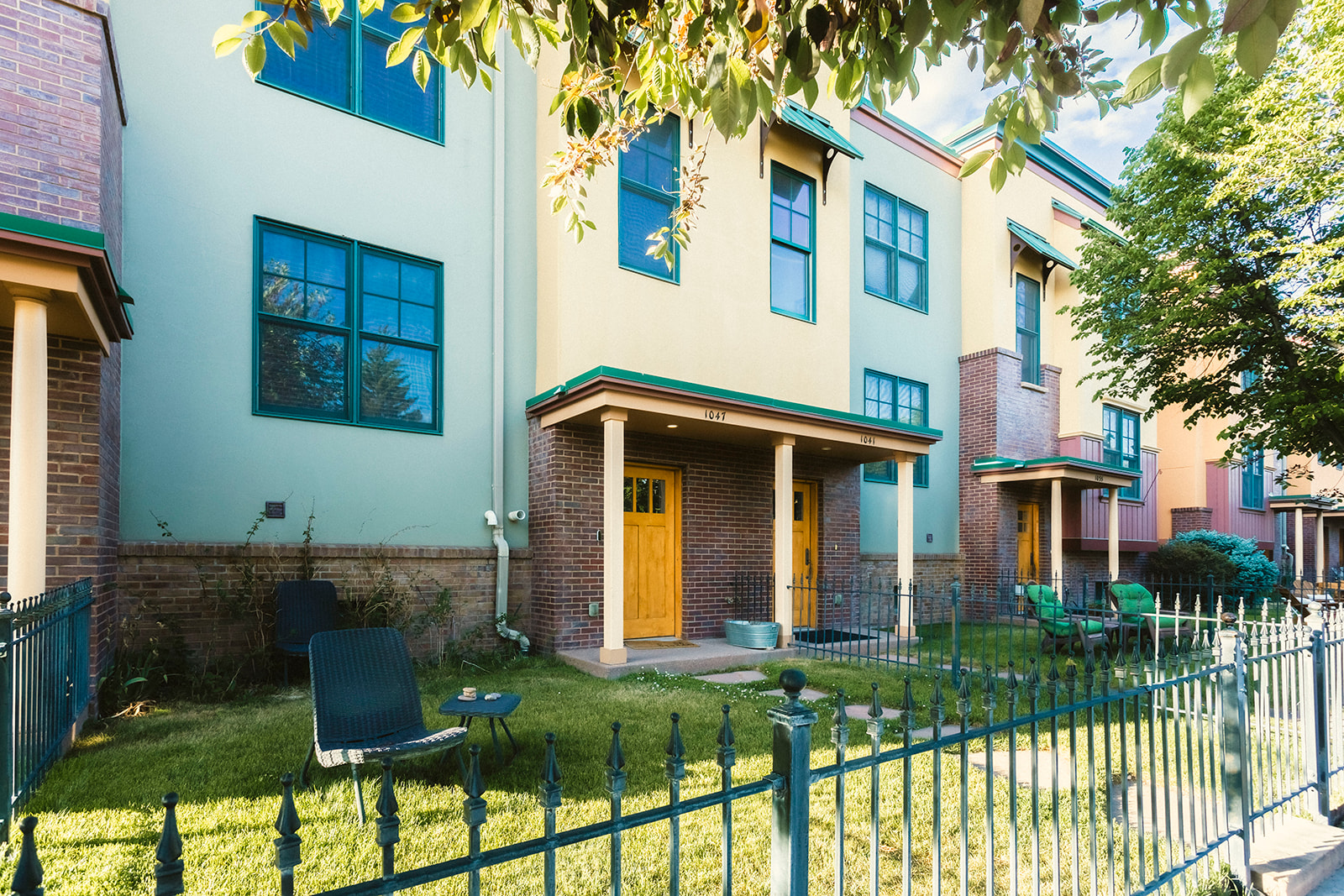 Attached Carbondale residences with individual entrances and landscaped front gardens