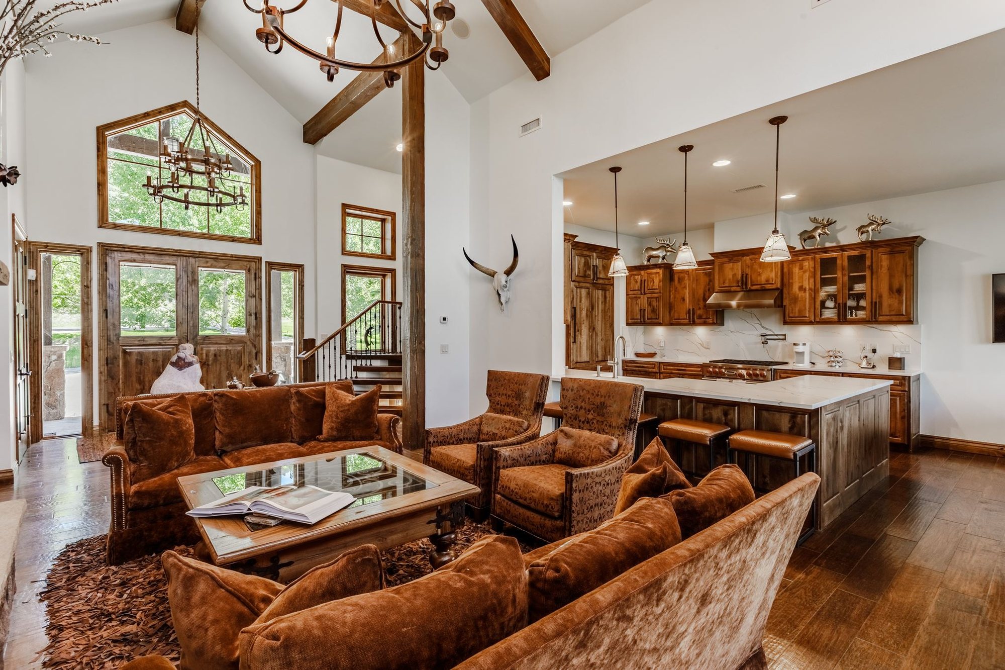 Expansive Larkspur living room and kitchen